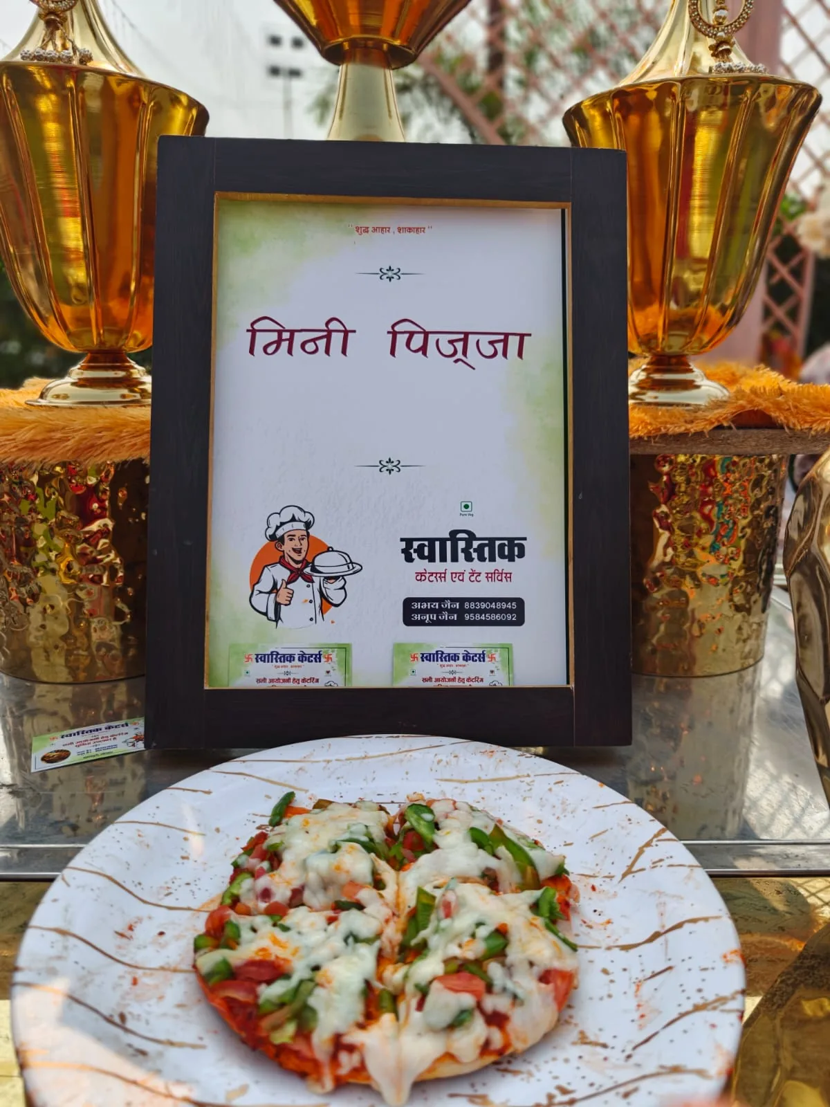 Mini pizza vegetarian live counter by Swastik Caters