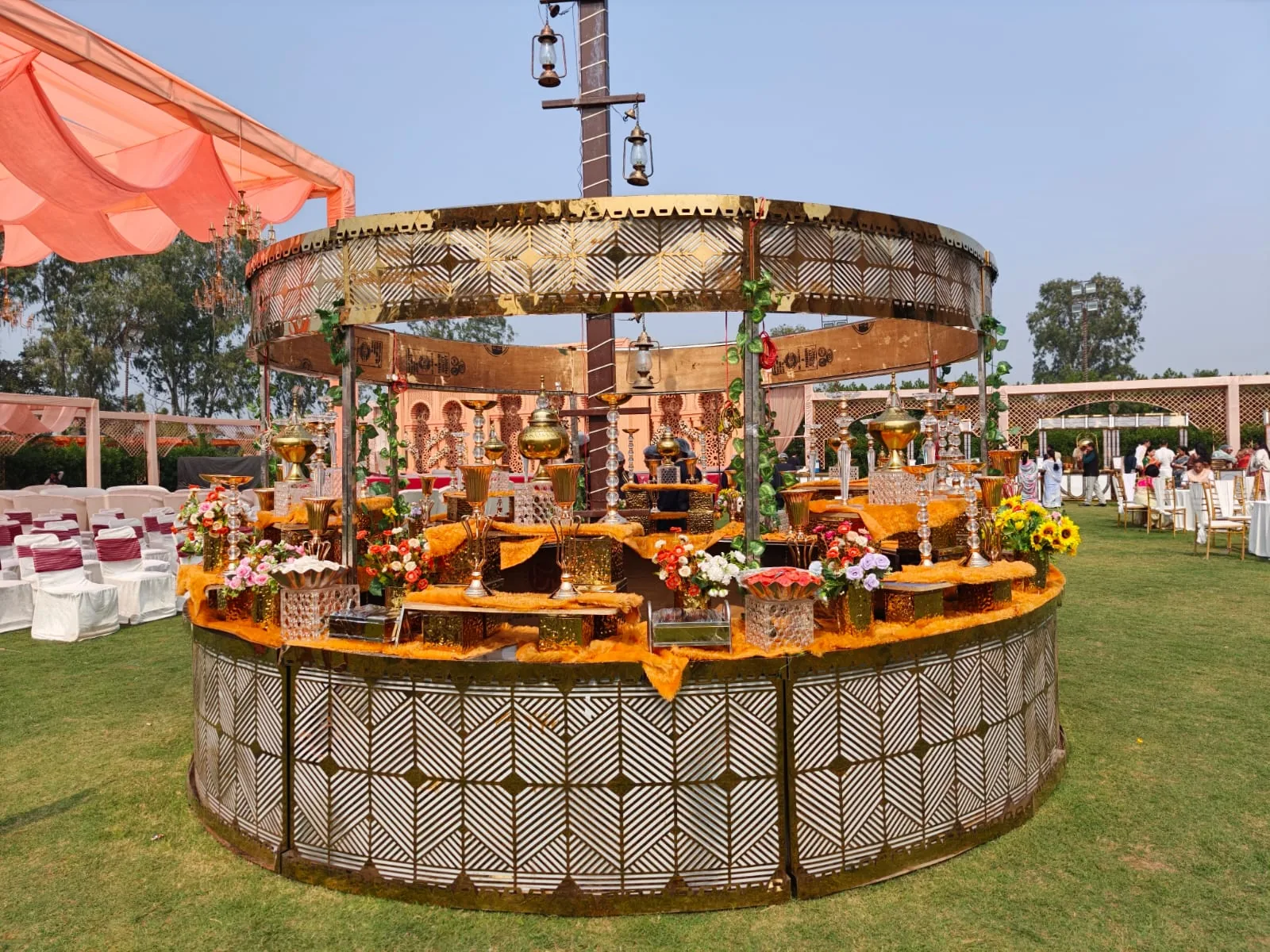 Circular premium wedding food display at an outdoor event