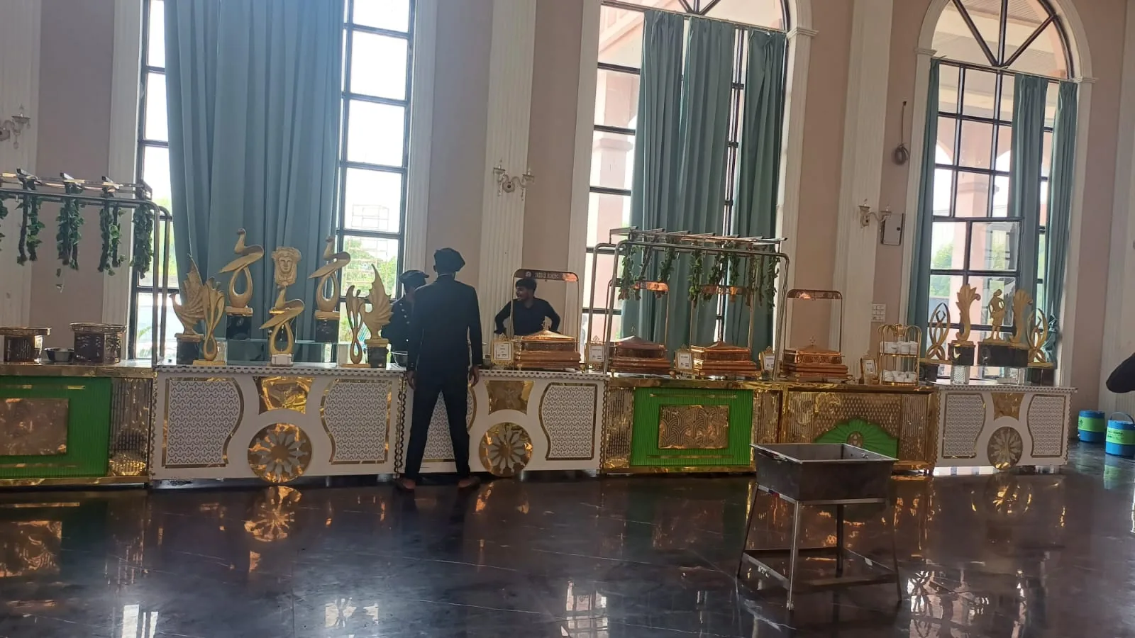 Indoor buffet counter with coordinated gold and green details